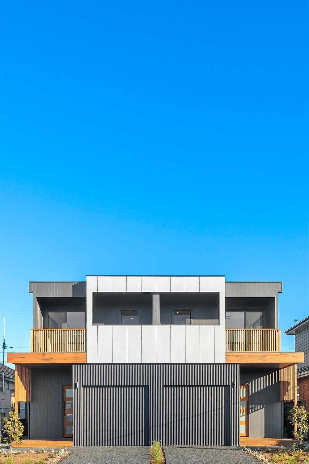 A Modern House With a Blue Sky in the Background — DeBu Studios In Russell Vale, NSW