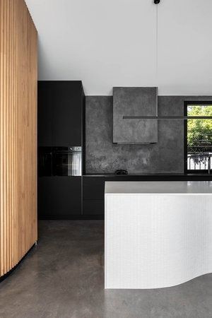 A Kitchen With Black Cabinets and a White Island — DeBu Studios In Russell Vale, NSW