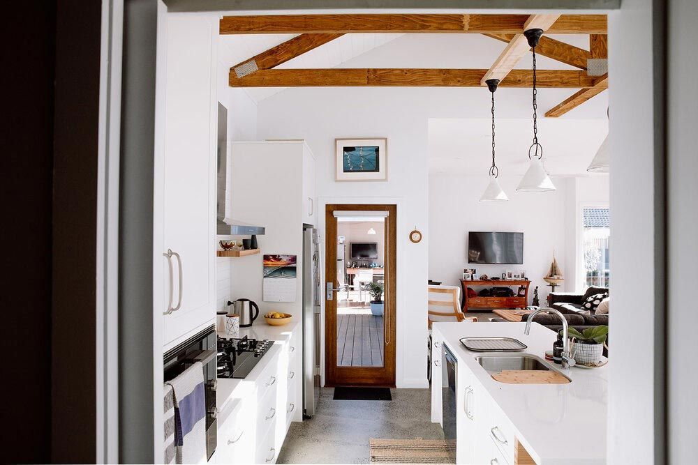 A Kitchen With White Cabinets — DeBu Studios In Russell Vale, NSW