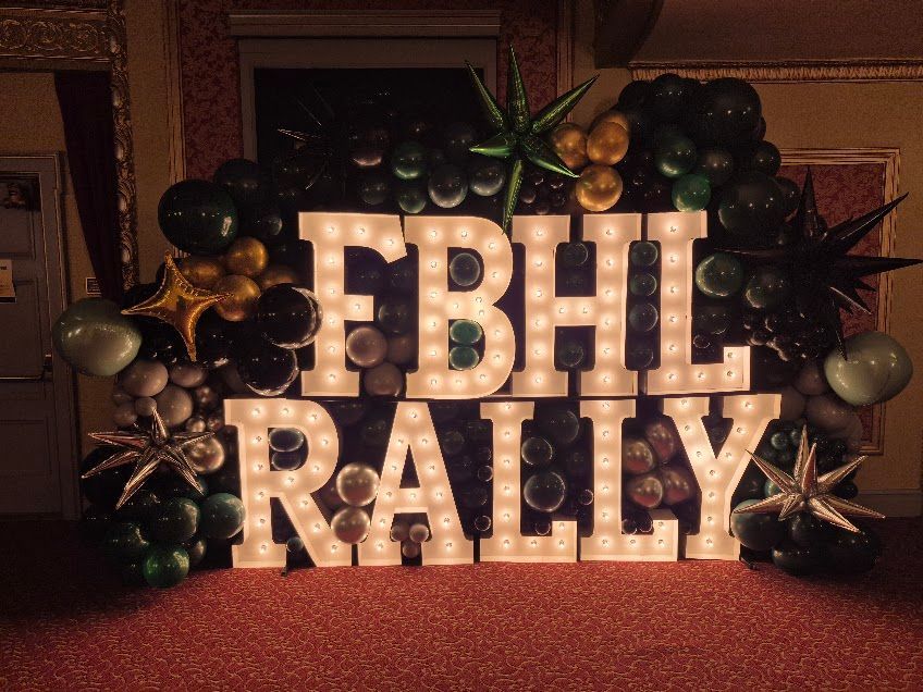 Sign with glowing letters reading