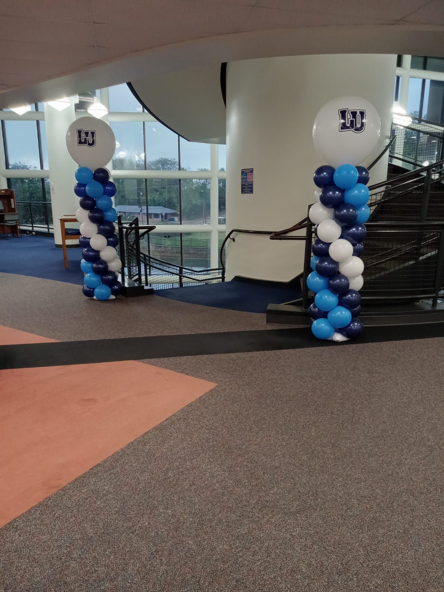 Blue and white balloons with the number 13 on them