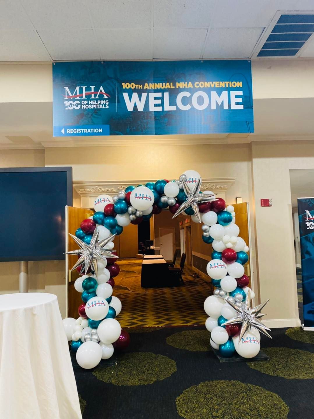Archway of balloons welcomes guests to an MHA convention.