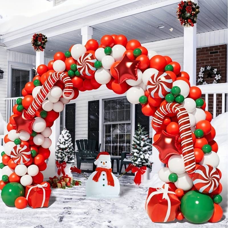 A christmas arch made of balloons and candy canes