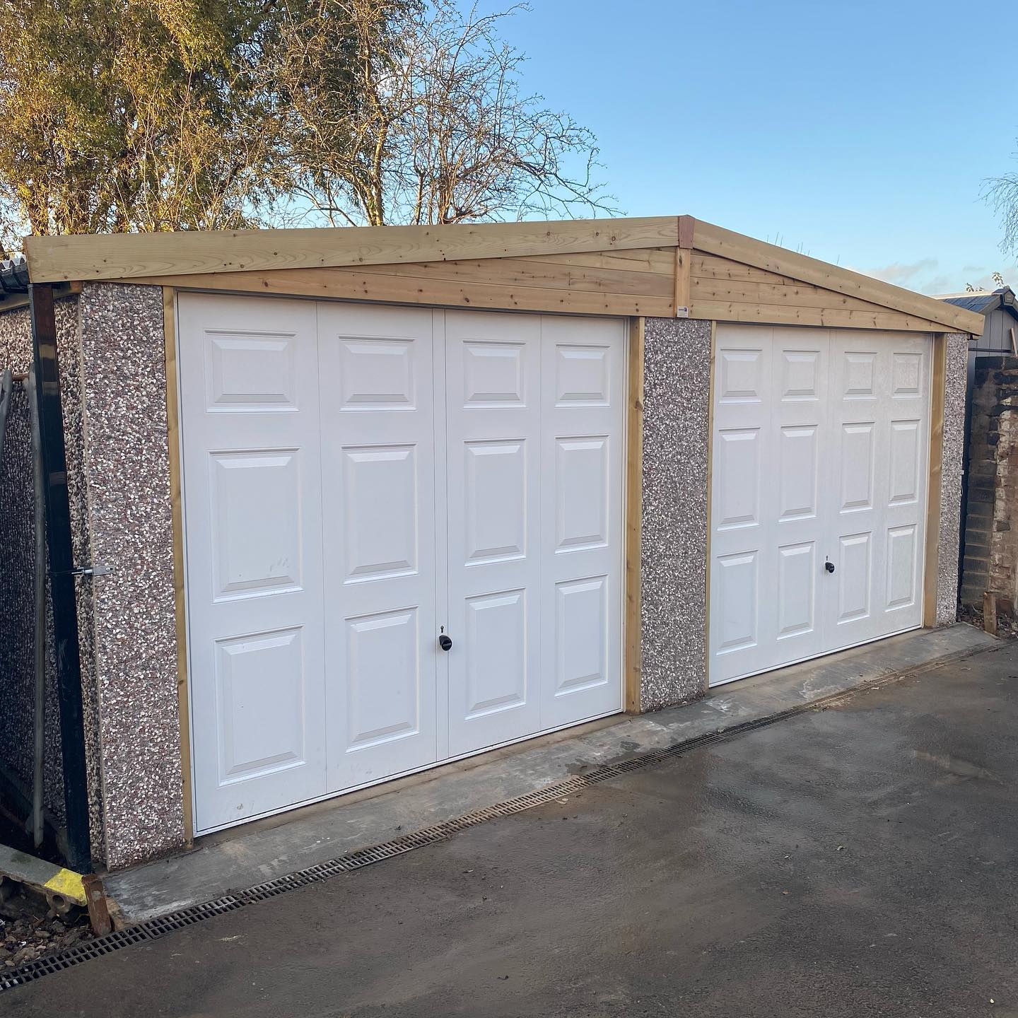 New garage with white doors