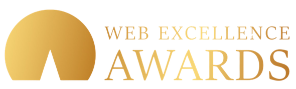 Gold logo for the Web Excellence Awards featuring a stylized sun graphic next to the text.