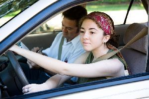 Father And Daughter Inside The Car — Clarksville, AR — Phil Taylor Insurance Agency, Inc.