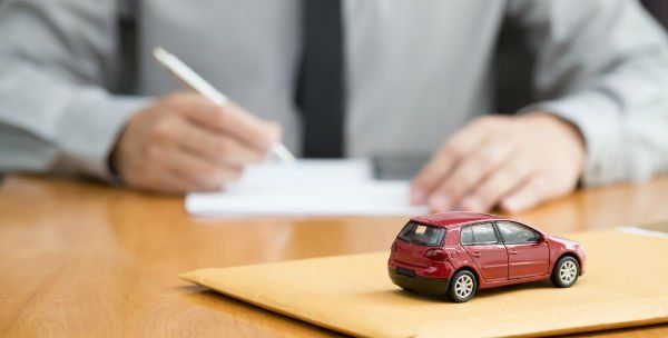 Mini Car On The Table — Clarksville, AR — Phil Taylor Insurance Agency, Inc.