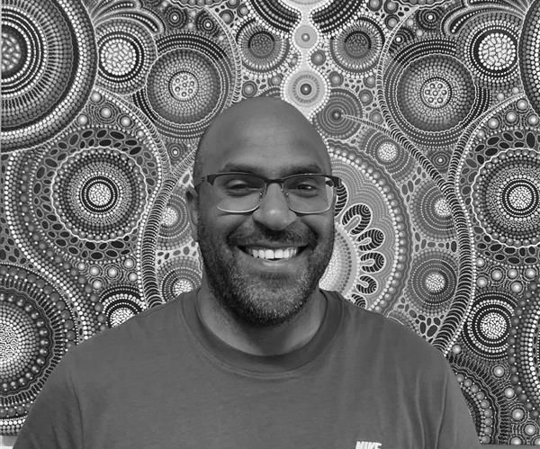 A white icon of two open doors on a black background.