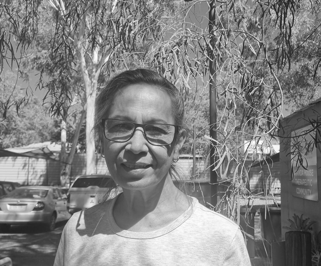 A white icon of two open doors on a black background.