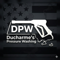 DPW Ducharme&rsquo;s Pressure Washing logo with white pressure washer over a dark American flag background