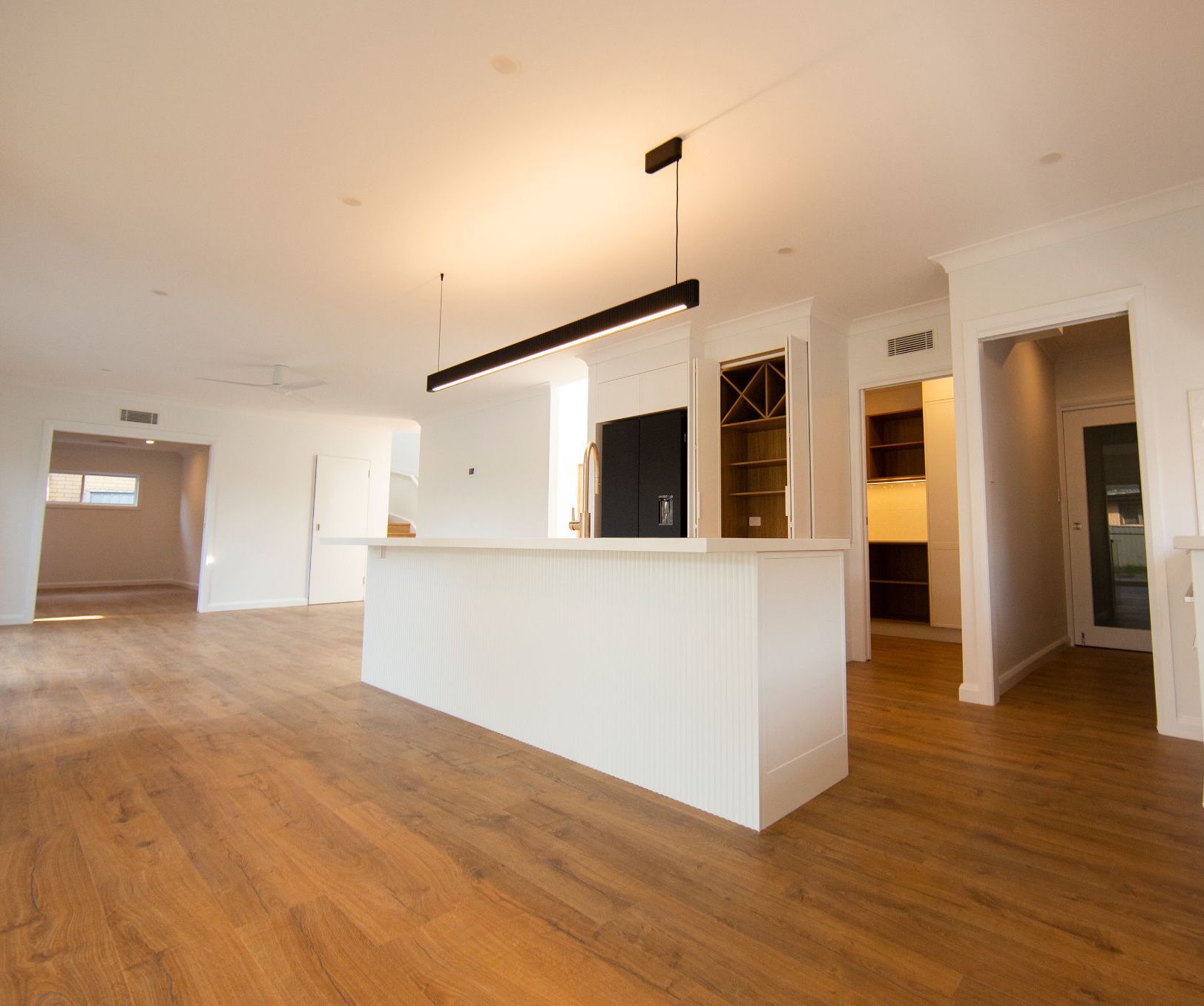 A Model House Is Sitting On Top Of A Bunch Of Blueprints — Beach Breeze Building In Tumbi Umbi, NSW