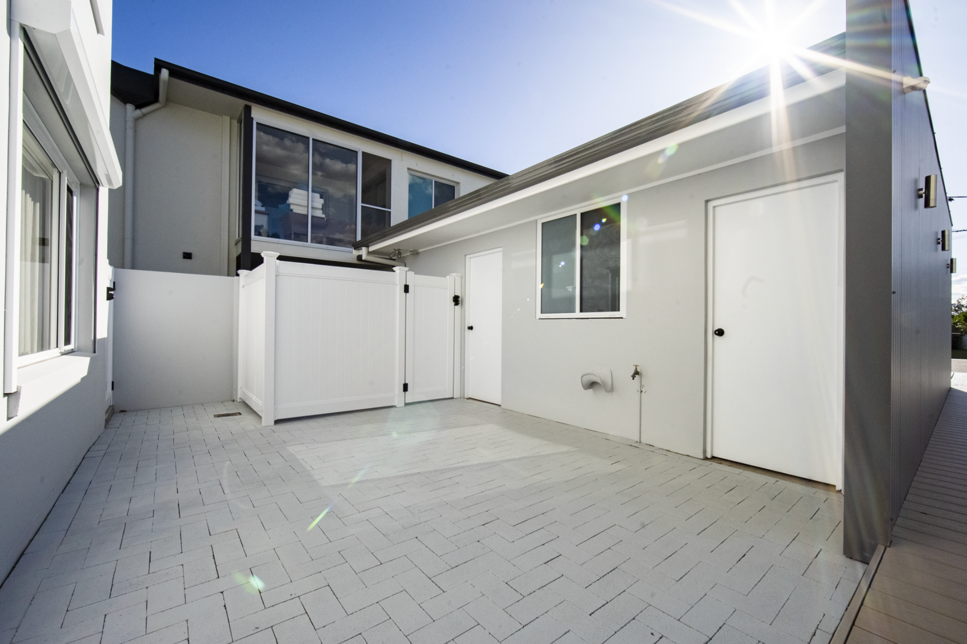 Paved Area Outside A House — Beach Breeze Building In Tumbi Umbi, NSW