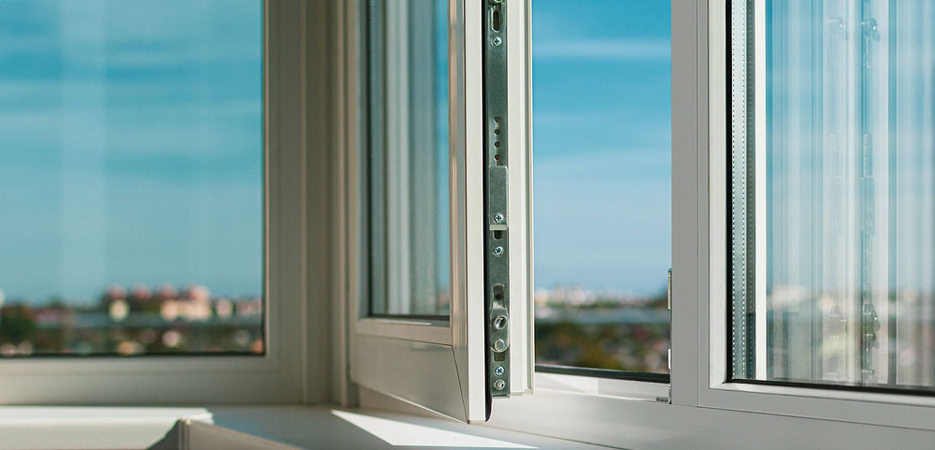 A Close Up Of An Open Window With A View Of A City — Beach Breeze Building In Tumbi Umbi, NSW