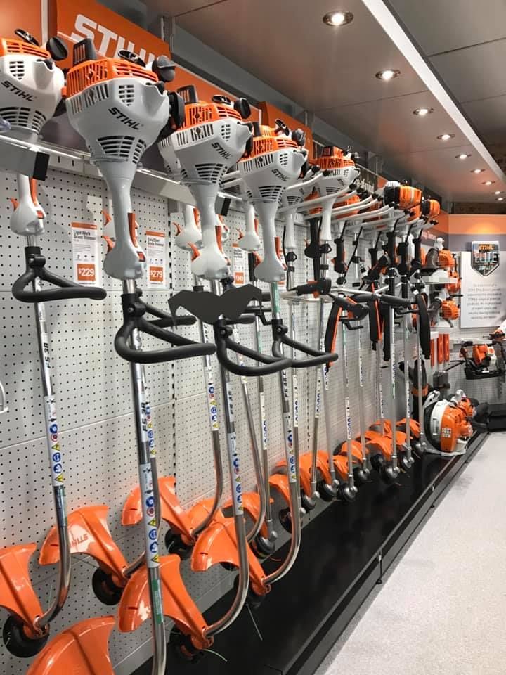 A Row Of STIHL Trimmers Are Lined Up In A Store — Ken Matthews Auto & Mower Centre In Ulladulla, NSW