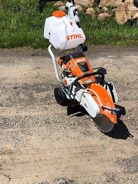 A STIHL Circular Saw Is Sitting On The Ground — Ken Matthews Auto & Mower Centre In Ulladulla, NSW