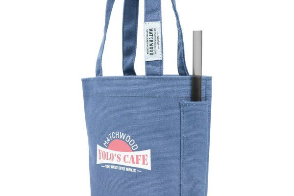 A blue tote bag that says old 's cafe on it