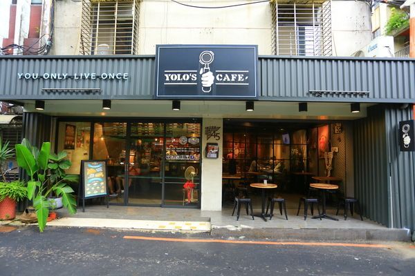 A restaurant with a sign that says you only live once