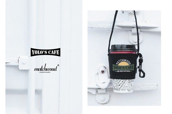 A picture of a coffee cup holder that says yolo 's cafe