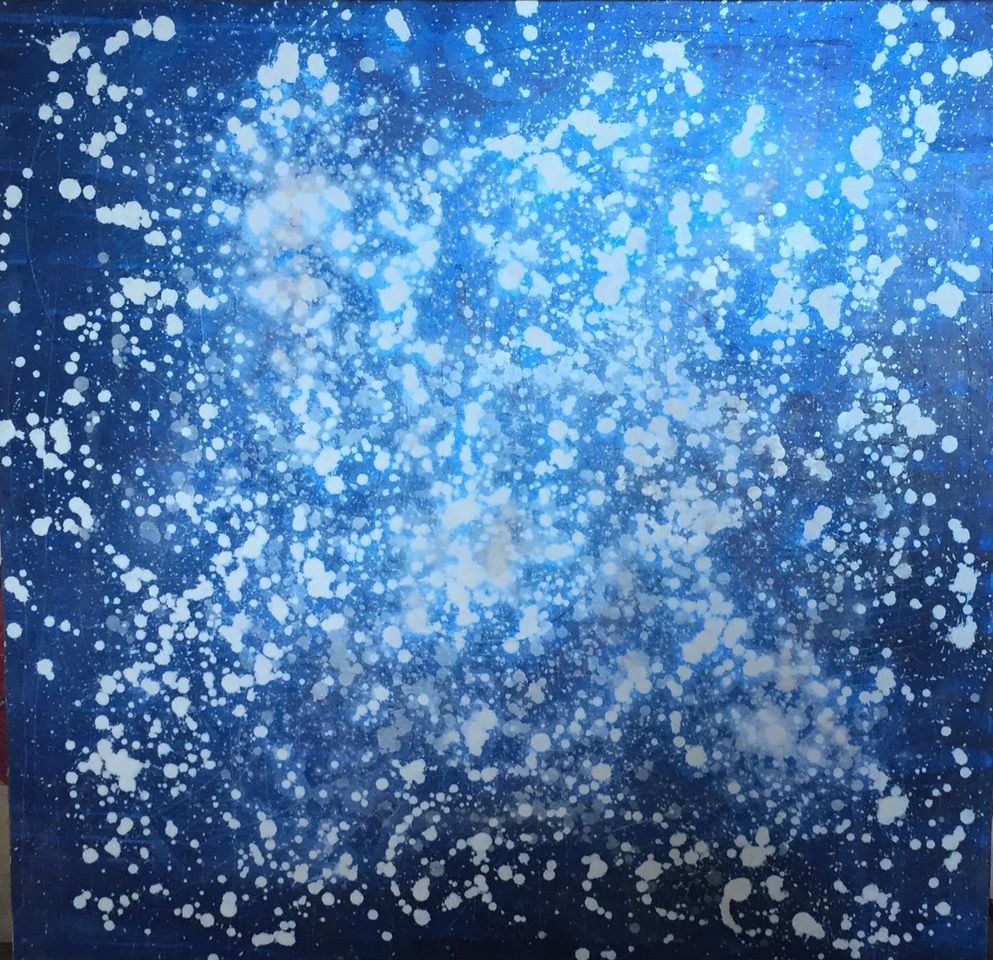 A blue background with white dots on it