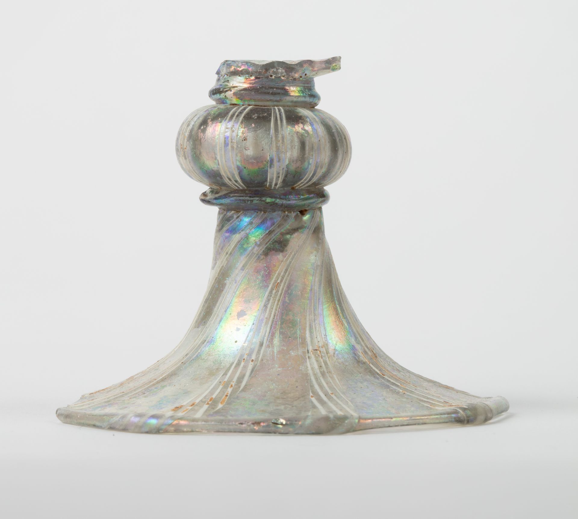 A clear glass candle holder