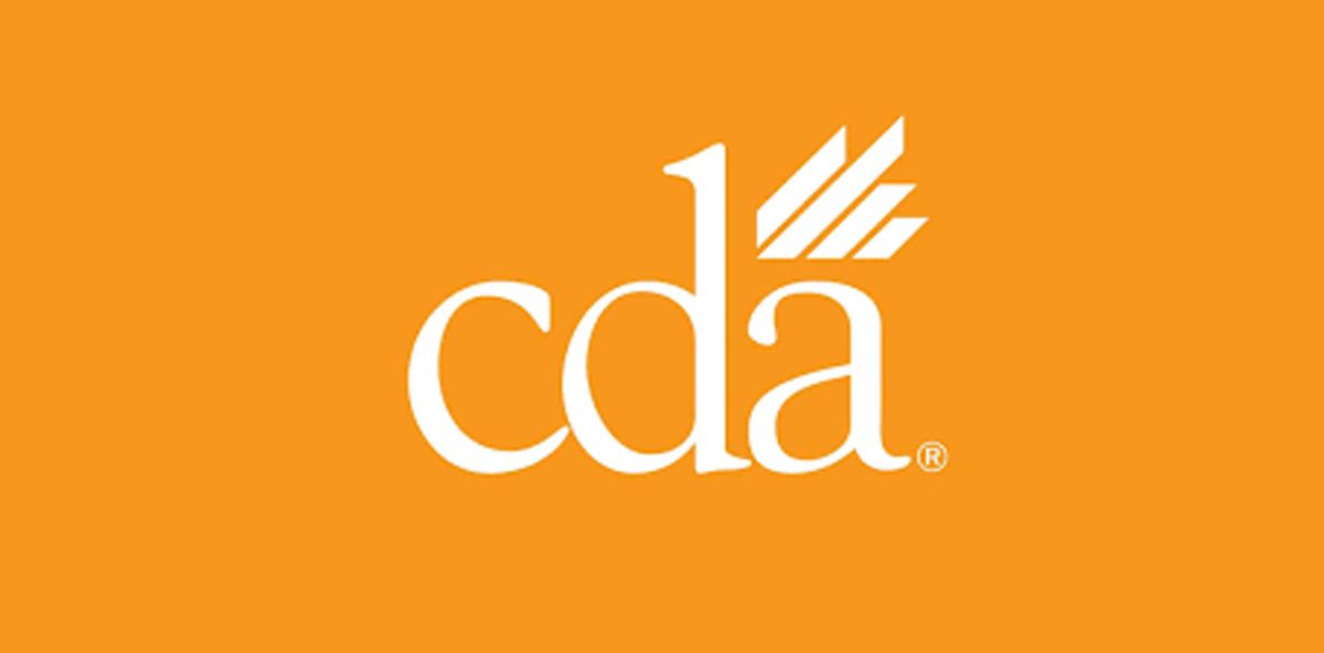 The cda logo is white on an orange background.