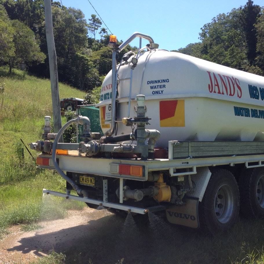 A jandy 's truck is parked on a dirt road — Glass~a~Water In Eungella, NSW