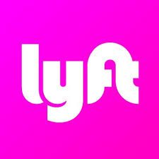 Lyft logo with white text on a pink background.