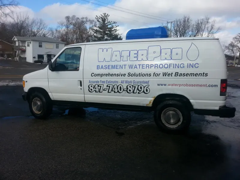 A white van from waterpro basement waterproofing inc