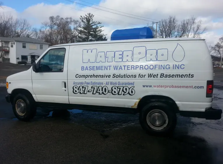 A white van from waterpro basement waterproofing inc