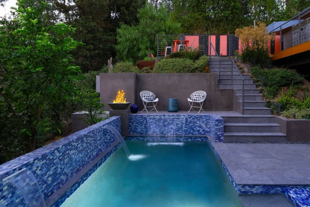 A large swimming pool with stairs leading up to it