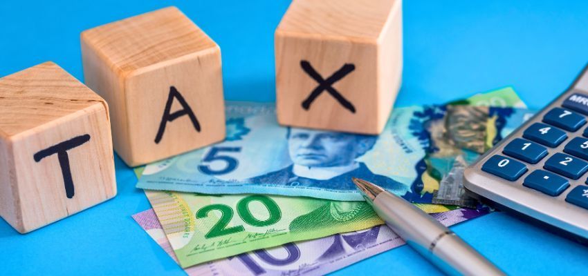 Wooden blocks create a tax word.