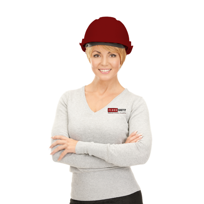 A woman wearing a hard hat and a sweater that says first