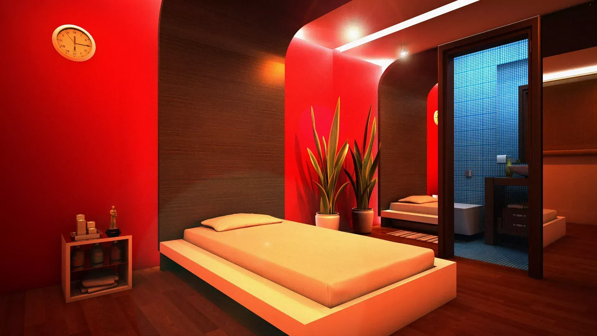 Um quarto moderno com paredes em um vermelho vibrante, uma cama baixa, plantas em vasos e um banheiro envidraçado.