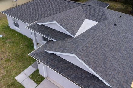 dark gray shingled roof installation in Melbourne, FL