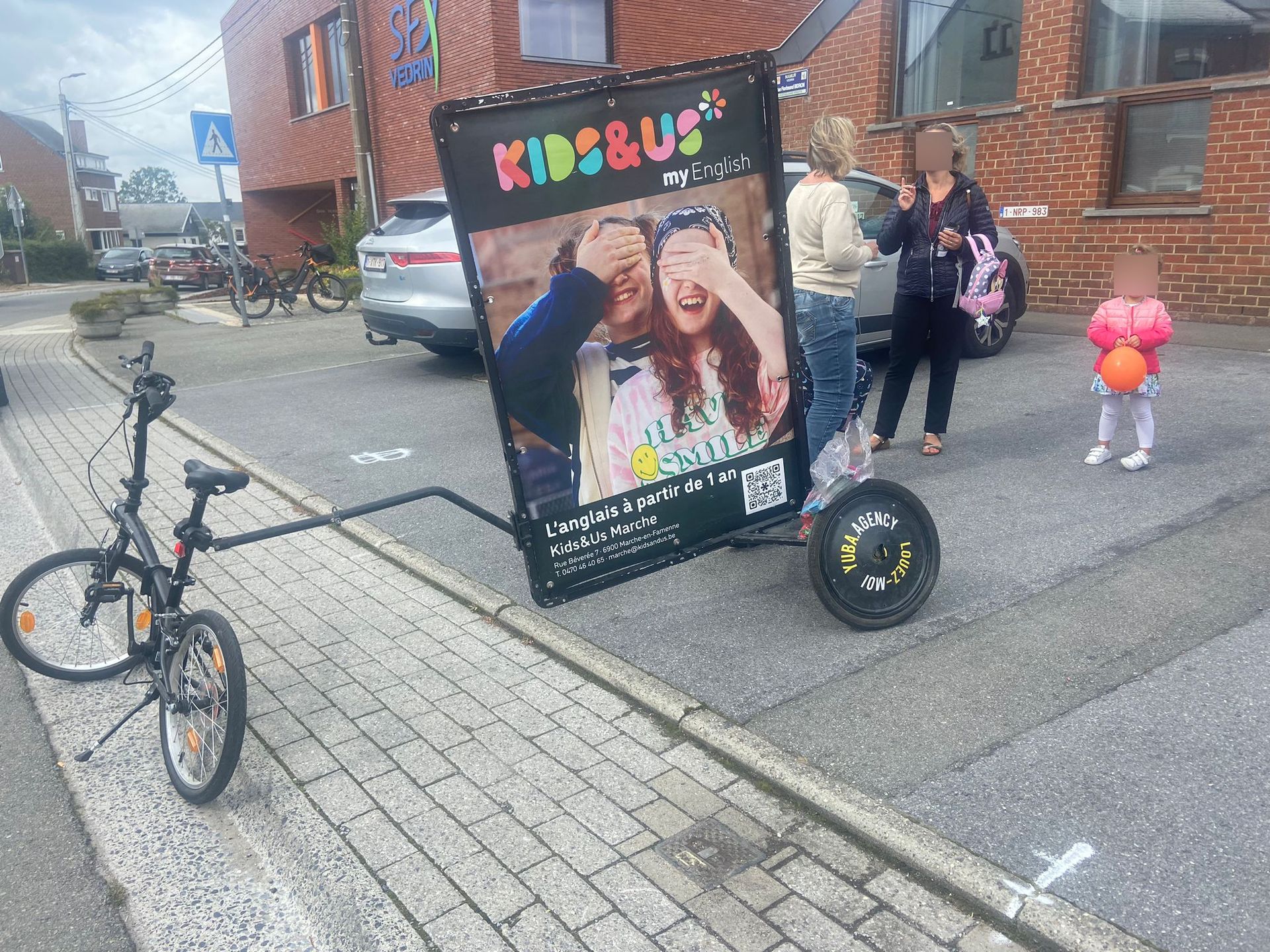 Vélo publicitaire Kids&Us