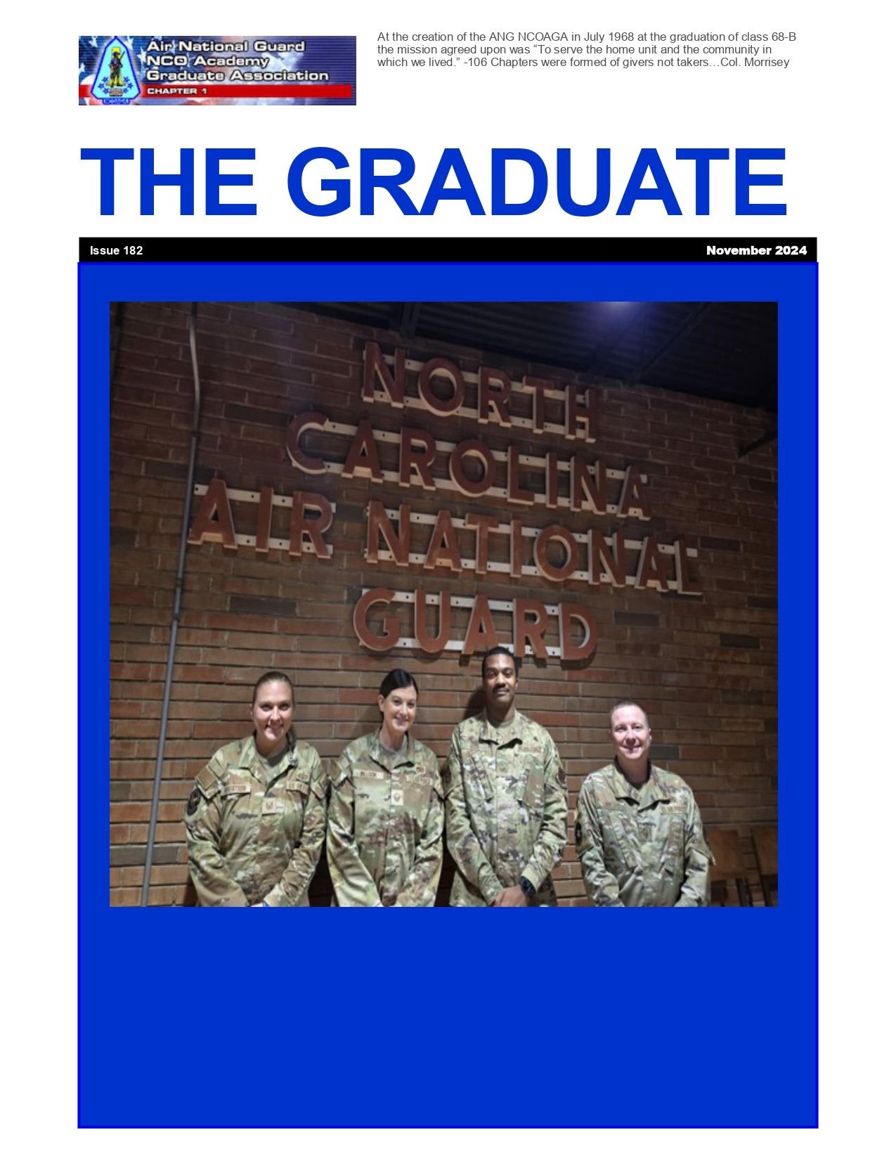 A group of soldiers are standing in front of a brick wall.