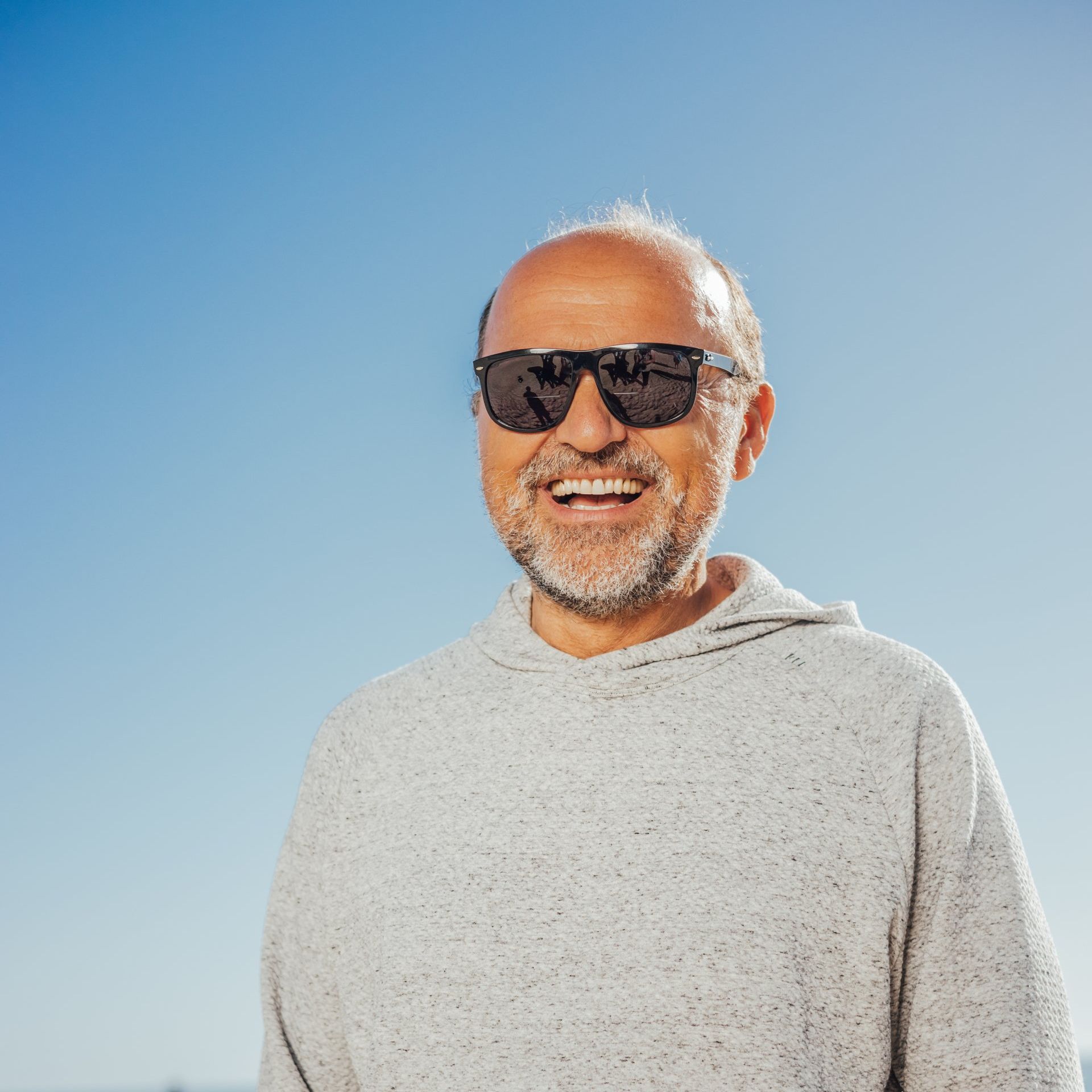 Looking up into a canyon with a white sky in the background