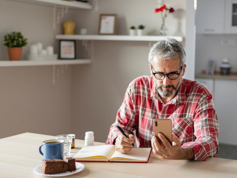 man looking at his phone