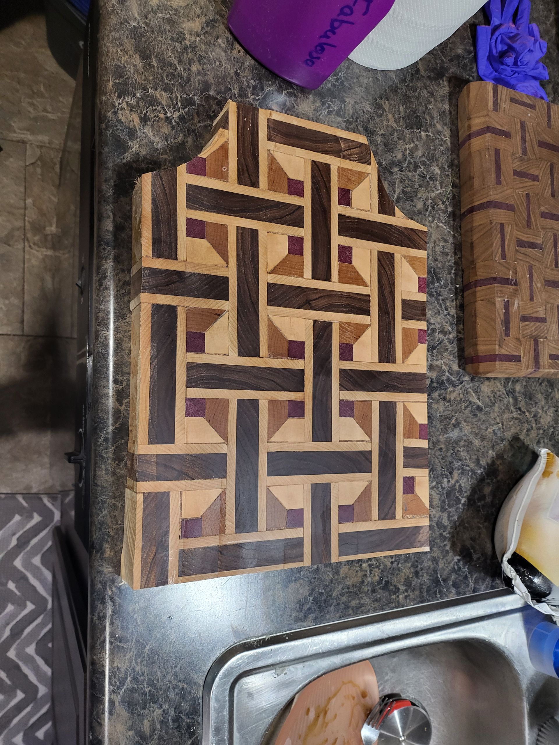 Jus t made cutting board from walnut, maple, cherry, and purple ?
