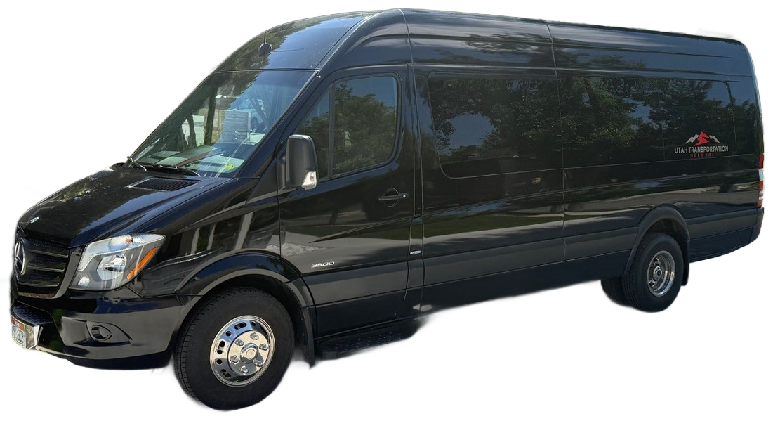 A black van with a lot of windows on a black background.