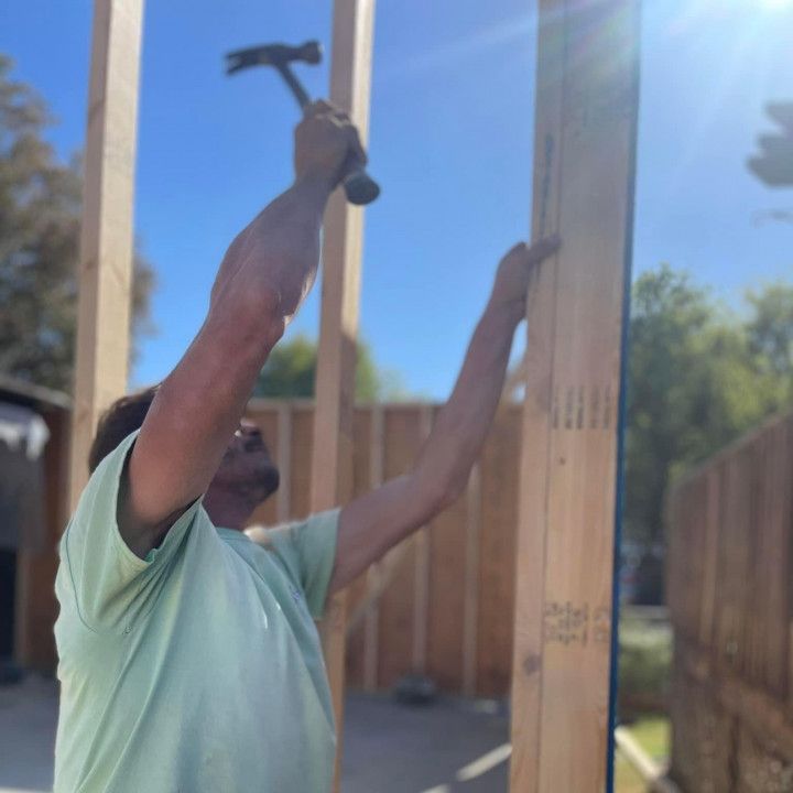 Man Constructing Home Expansion