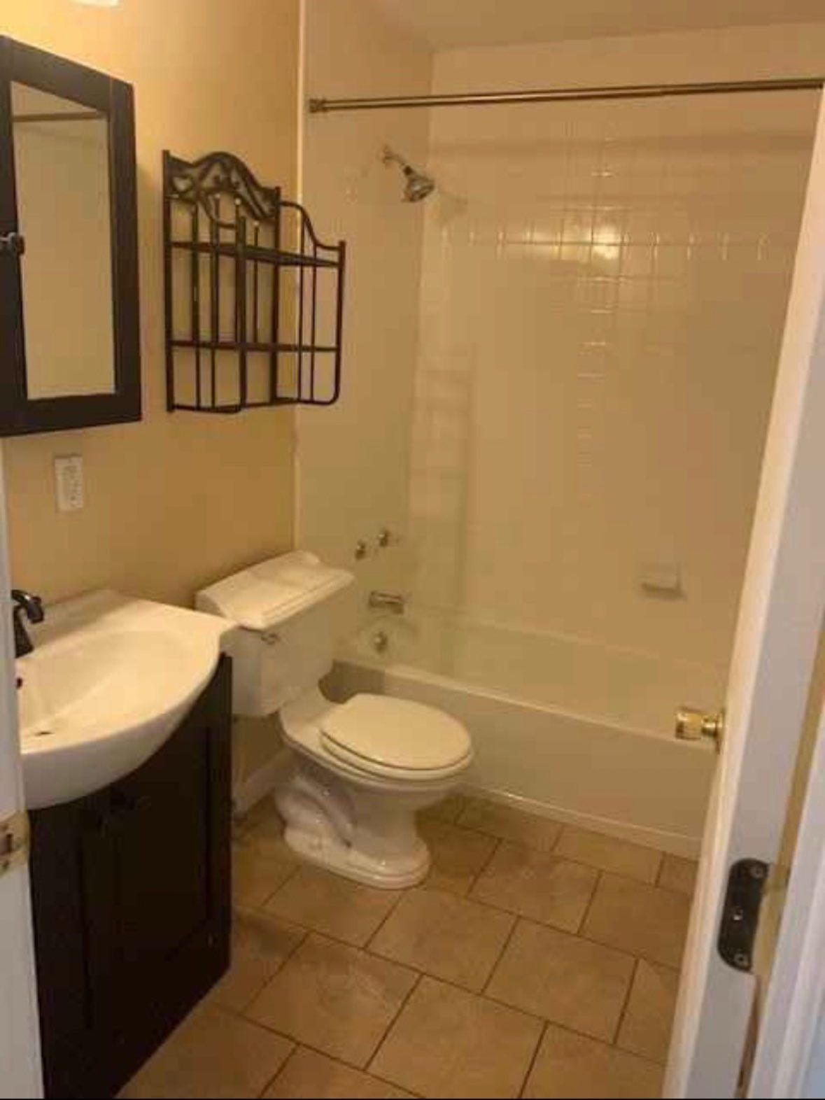A bathroom under construction with a sink and a door.