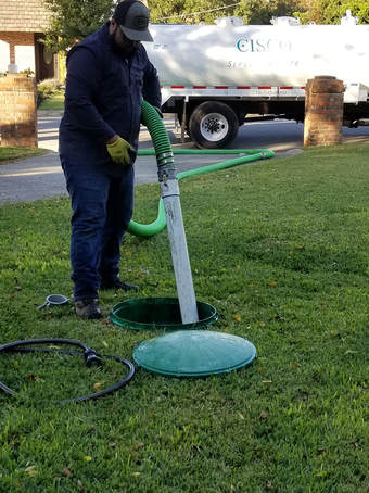 Our team providing septic services in San Antonio.