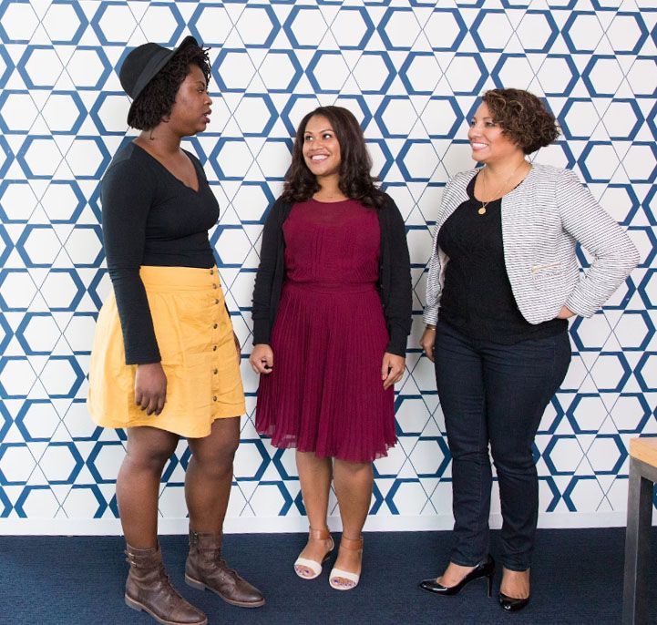 A 360 degree photo booth with a ring light and a case.