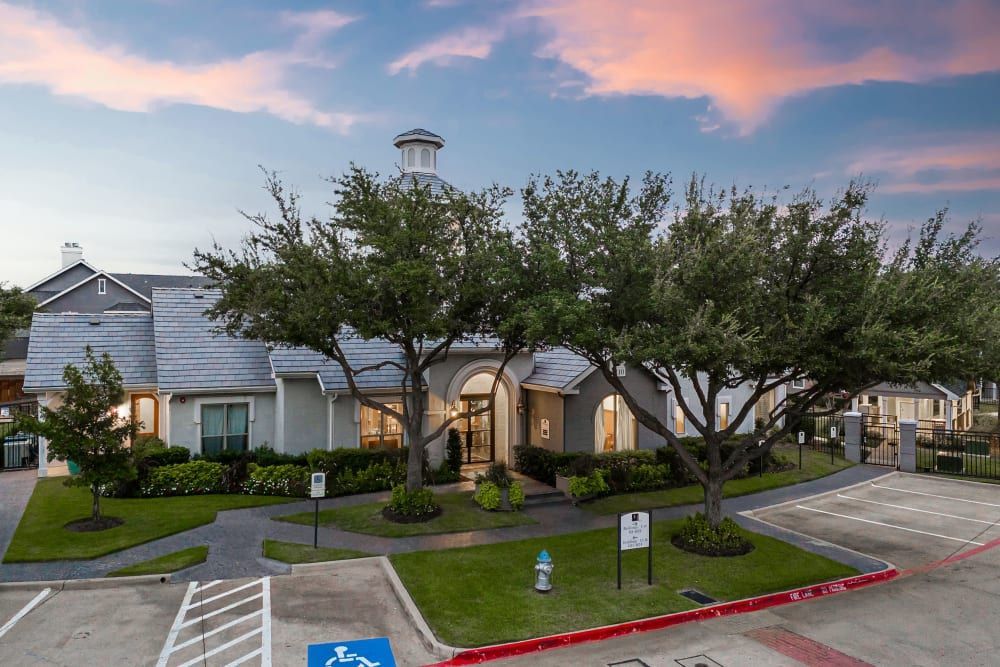 an aerial view of a house with a handicapped parking sign in front of it at Marquis at Lantana in Flower Mound, TX.