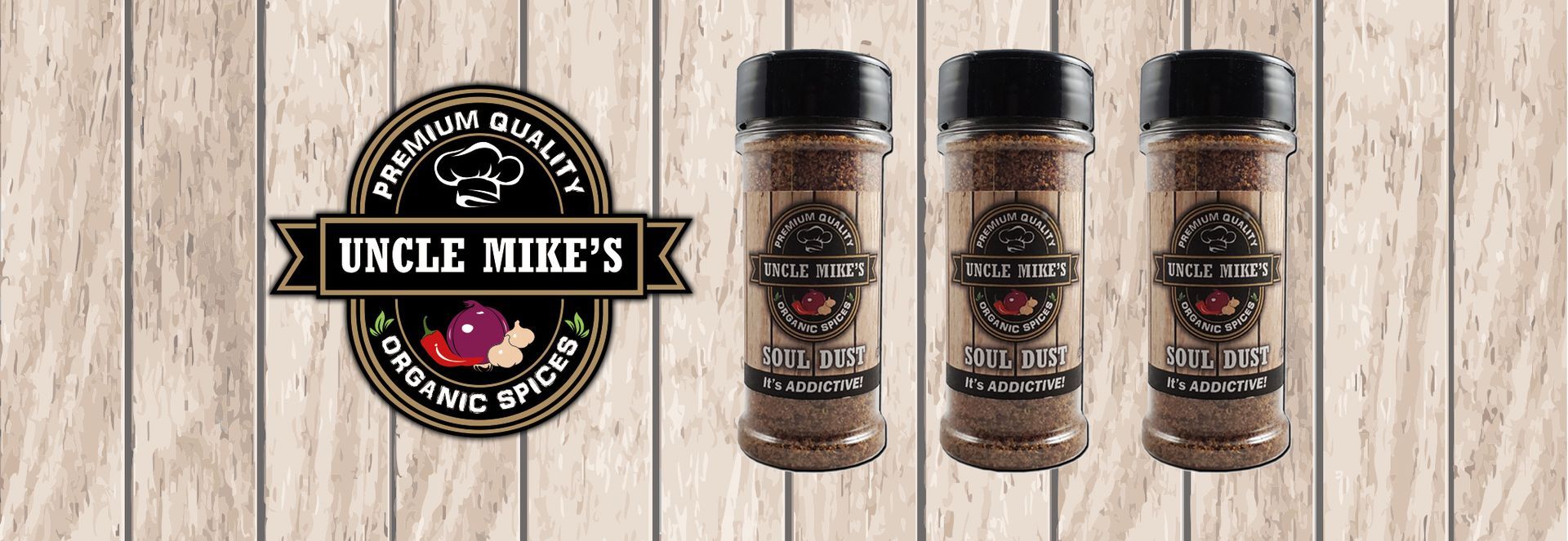 Three bottles of uncle richie 's seasoning on a wooden table