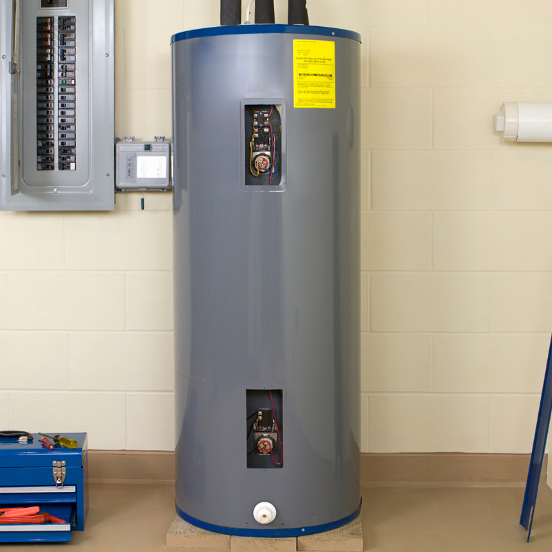 Picture of a water heater in a utility room.