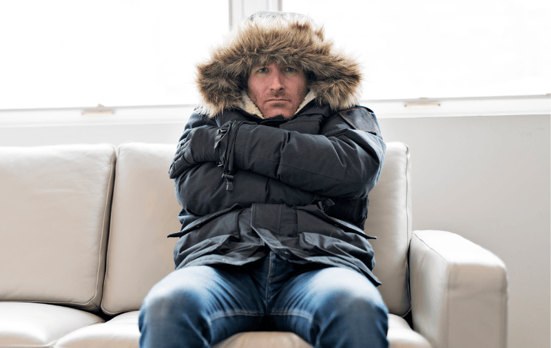 Picture of a man bundled with a jacket inside.