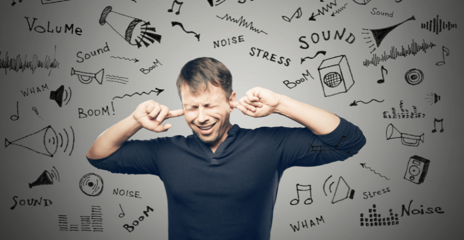 Picture of a man plugging his ears.