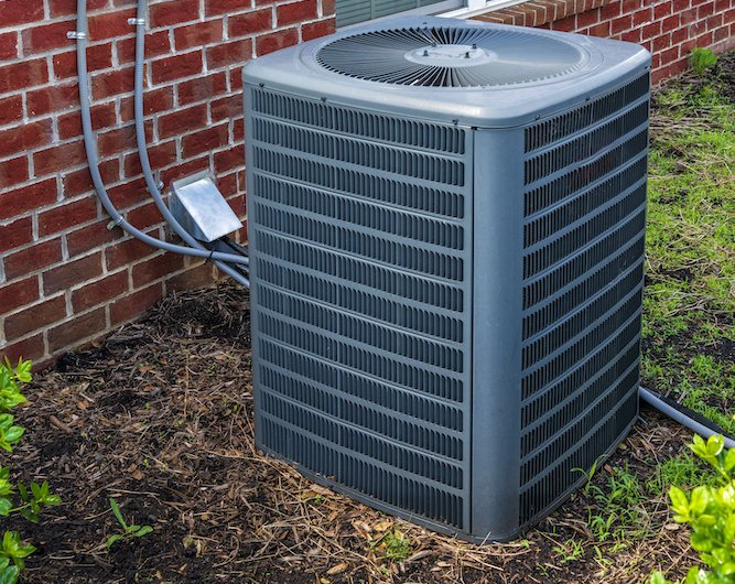 Picture of an outdoor heat pump.